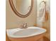 Bathroom featuring chrome faucet, neutral paint, large mirror and neutral decor at 680 Emeril Dr, Avondale Estates, GA 30002