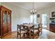Spacious dining room features hardwood floors, neutral paint, and lots of natural light at 680 Emeril Dr, Avondale Estates, GA 30002