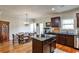 Eat-in kitchen with wooden floors, granite counters, stainless steel appliances and plenty of storage at 680 Emeril Dr, Avondale Estates, GA 30002