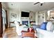 Spacious living room features hardwood floors, a fireplace, and plenty of natural light at 680 Emeril Dr, Avondale Estates, GA 30002