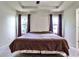 Primary bedroom with neutral color palette, plush carpet and plenty of natural light at 680 Emeril Dr, Avondale Estates, GA 30002