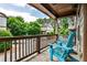 Inviting porch with blue chairs overlooking a quiet street, perfect for relaxation and enjoying the outdoors at 680 Emeril Dr, Avondale Estates, GA 30002