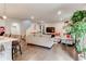 Bright living room with hardwood floors and neutral-toned furniture, perfect for relaxation and entertaining at 230 Mackenzie Ct, Covington, GA 30016