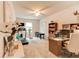Bright office space with a workstation, treadmill, and natural light for a productive and healthy lifestyle at 230 Mackenzie Ct, Covington, GA 30016