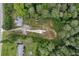 A lovely, private lot surrounded by mature trees with an existing foundation and homes nearby at 2552 Scenic S Hwy, Snellville, GA 30078