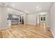 Open concept living space with hardwood floors, stainless steel appliances, and tons of natural light at 2552 Scenic S Hwy, Snellville, GA 30078