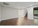 Unfinished basement featuring wood floors and a staircase at 46 Highland Ct, Carrollton, GA 30116