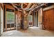 Exposed basement utility area ready for finishing or storage, including HVAC and plumbing at 46 Highland Ct, Carrollton, GA 30116