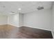 Spacious unfinished basement with wood floors and neutral paint at 46 Highland Ct, Carrollton, GA 30116