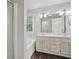 Bright bathroom with dual sinks, soaking tub, and natural light at 46 Highland Ct, Carrollton, GA 30116
