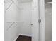 Walk-in closet with shelving and a glass-doored shower at 46 Highland Ct, Carrollton, GA 30116