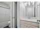 Bathroom with shower, vanity, and storage at 46 Highland Ct, Carrollton, GA 30116