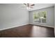 Bright bedroom with large window and hardwood flooring at 46 Highland Ct, Carrollton, GA 30116