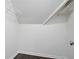 Walk-in attic closet with wood floors and wire shelves at 46 Highland Ct, Carrollton, GA 30116