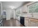 Well-lit kitchen and dining area with modern appliances and fixtures at 46 Highland Ct, Carrollton, GA 30116