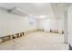 Unfinished basement provides a blank canvas for customization and ample potential at 6071 Cristie Dr, Ellenwood, GA 30294