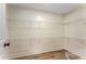 Large walk-in closet with wire shelving, wood floors, and neutral walls at 1364 Willis Mill Sw Rd, Atlanta, GA 30311