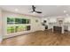 Modern kitchen with stainless steel appliances, white cabinets, and an island at 1364 Willis Mill Sw Rd, Atlanta, GA 30311