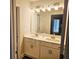 Bathroom featuring double vanity sinks, modern fixtures, and bright lighting at 309 Melanie Ct, Bowdon, GA 30108
