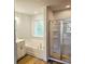 This bathroom offers a soaking tub, a separate shower, and vanity, for a spa-like experience at home at 309 Melanie Ct, Bowdon, GA 30108