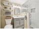 Beautiful bathroom featuring a stand up shower, modern vanity with ample storage, and stylish shelving at 159 Cavan Se Way, Mableton, GA 30126