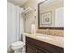 Upstairs bathroom with shower, vanity, toilet, and towel bar at 159 Cavan Se Way, Mableton, GA 30126