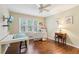 Craft room with light-colored walls, hardwood floors, and a sewing table at 159 Cavan Se Way, Mableton, GA 30126