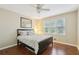 Bedroom with a window providing ample natural light and hardwood floors at 159 Cavan Se Way, Mableton, GA 30126