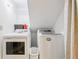 Efficient laundry room with modern appliances and shelving at 159 Cavan Se Way, Mableton, GA 30126