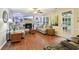 Cozy living room with fireplace, built-in shelves, hardwood floors, and patio access at 159 Cavan Se Way, Mableton, GA 30126