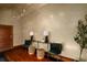 Elegant entryway featuring wood floors, stylish console table, seating, and designer lighting at 3334 Peachtree Ne Rd # 1707, Atlanta, GA 30326