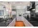 Sleek kitchen featuring stainless steel appliances, modern cabinets, and black granite countertops at 3334 Peachtree Ne Rd # 1707, Atlanta, GA 30326