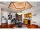 Bright, modern kitchen with stainless steel appliances, hardwood floors, and a stylish chandelier at 3334 Peachtree Ne Rd # 1707, Atlanta, GA 30326
