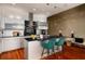 Well-appointed kitchen featuring stainless steel appliances, bar seating, and modern finishes at 3334 Peachtree Ne Rd # 1707, Atlanta, GA 30326