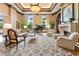 Elegant living room with a grand piano, fireplace, and sophisticated furnishings at 3334 Peachtree Ne Rd # 1707, Atlanta, GA 30326