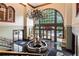 Stunning lobby with a chandelier, large windows, a fountain, and elegant decor at 3334 Peachtree Ne Rd # 1707, Atlanta, GA 30326