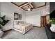 Bright bedroom with a decorative ceiling, stylish furnishings, and balcony access, creating a comfortable and inviting space at 3334 Peachtree Ne Rd # 1707, Atlanta, GA 30326