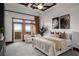 Serene bedroom with balcony access, neutral tones, and stylish decor creating a tranquil retreat for relaxation and restful sleep at 3334 Peachtree Ne Rd # 1707, Atlanta, GA 30326