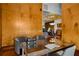Office with stylish wood paneling, a glass desk, and access to kitchen and dinning at 3334 Peachtree Ne Rd # 1707, Atlanta, GA 30326