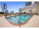 Rooftop pool offers city views with lounge chairs and well-maintained landscaping at 3334 Peachtree Ne Rd # 1707, Atlanta, GA 30326