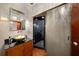 Stylish powder room with a vessel sink, modern fixtures, and glass-enclosed shower at 3334 Peachtree Ne Rd # 1707, Atlanta, GA 30326