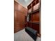 Organized closet features wood shelving, drawers, and hanging rods for efficient storage at 3334 Peachtree Ne Rd # 1707, Atlanta, GA 30326