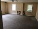 Spacious bedroom with carpet flooring, and lots of natural light at 4485 Merlin Ne Cir, Douglasville, GA 30134