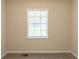 Bedroom with natural light and neutral paint that shows a window at 4669 Birch Ridge Trl, Stone Mountain, GA 30083