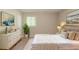 Calm main bedroom with neutral tones, large bed, elegant dresser and natural lighting from the window at 4669 Birch Ridge Trl, Stone Mountain, GA 30083