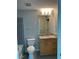 Modern bathroom with granite countertop, vanity, and tiled shower at 361 17Th Nw St # 1303, Atlanta, GA 30363