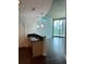 Kitchen with bar-top seating, pendant lights, and views of the city at 361 17Th Nw St # 1303, Atlanta, GA 30363