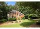 Attractive two-story brick home with a well-maintained lawn and landscaping at 6435 Ivey Creek Cir, Cumming, GA 30040