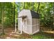 Backyard shed, offering additional storage space and potential for various uses at 6435 Ivey Creek Cir, Cumming, GA 30040
