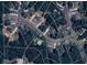 A street view showcases the property's location in a residential area with nearby streets and surrounding mature trees at 6435 Ivey Creek Cir, Cumming, GA 30040